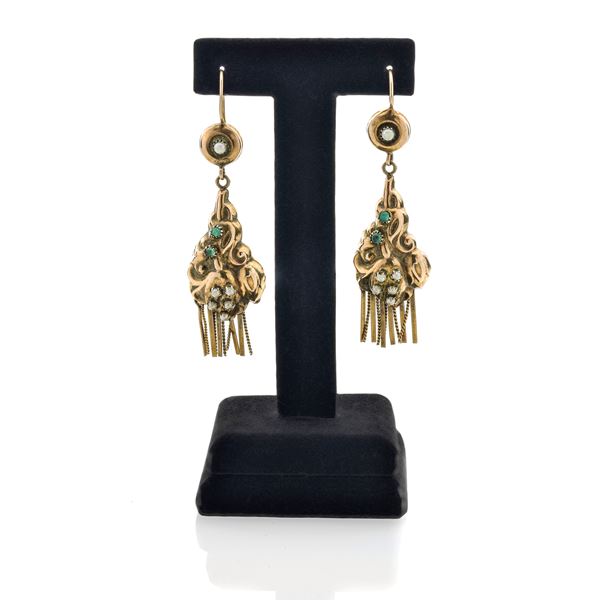 Pair of low title gold pendant earrings and green stones