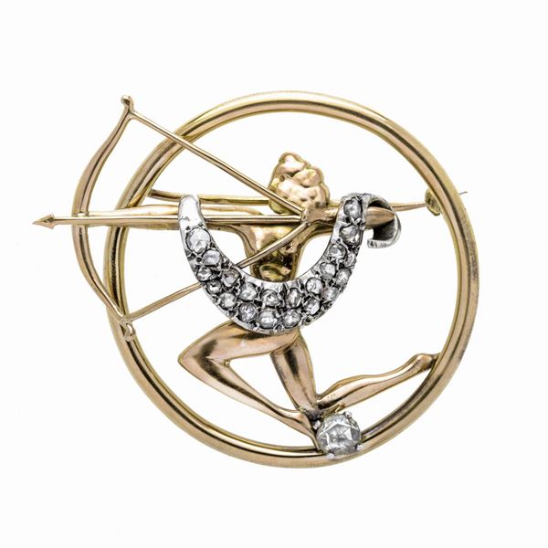 Sagittarius brooch in 14 kt gold, silver and diamonds
