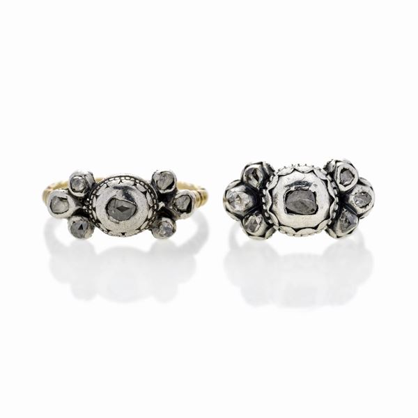 Two rings in low title gold, silver and diamonds