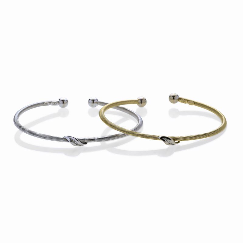 Coppia di Bracciali Rigidi in Oro Giallo, Oro Bianco e Diamanti