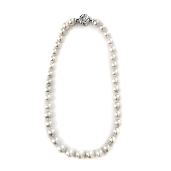 Necklace in pearls, white gold and diamonds