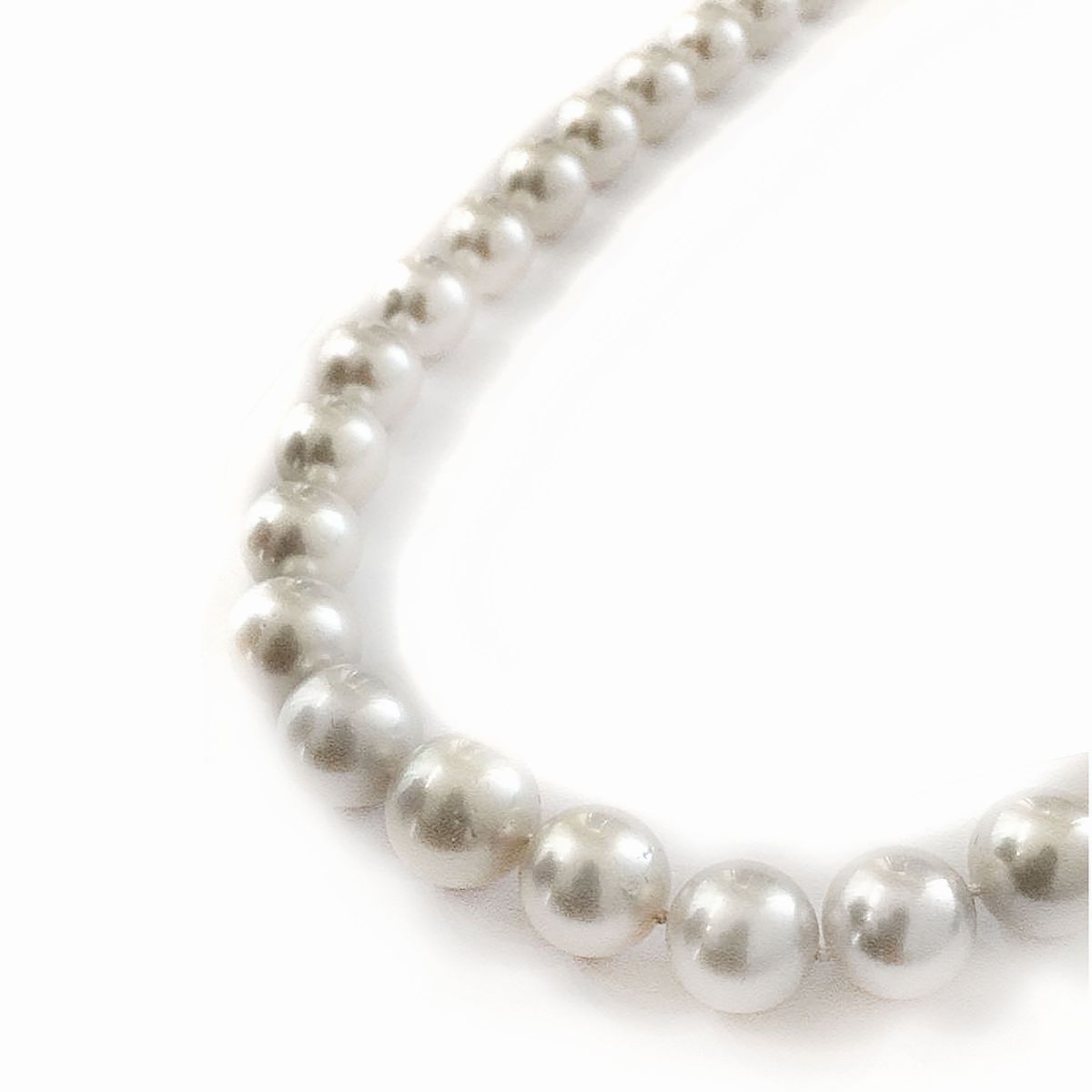 Filo in Perle Australine, Oro Bianco e Diamanti