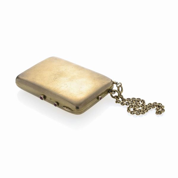 Trousse in gilded silver and rubies