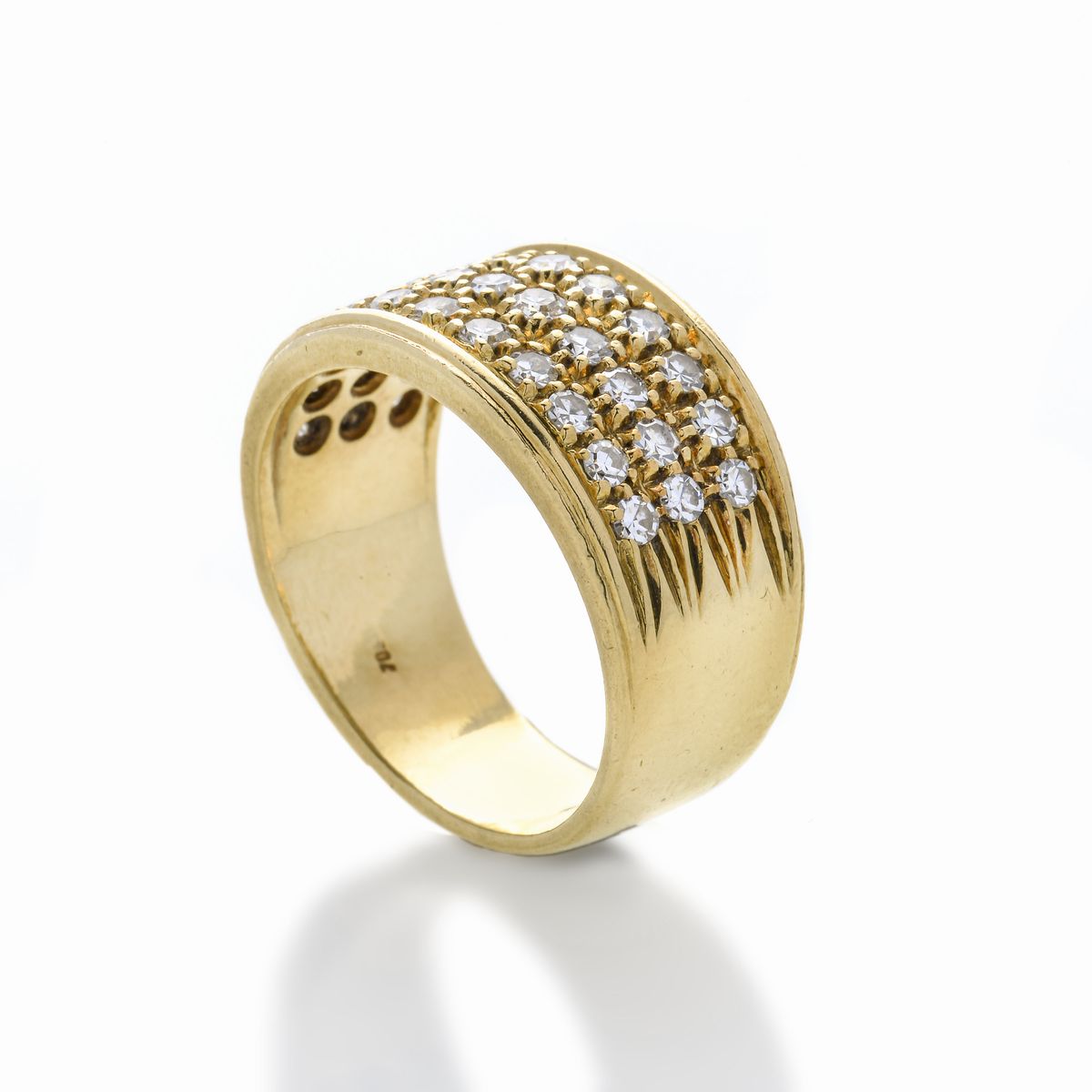 Anello a fascia in oro giallo e diamanti