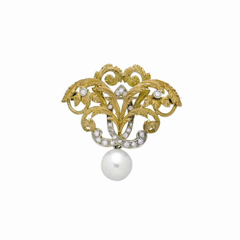 Spilla in oro giallo, oro bianco, diamanti e perla