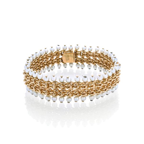 Bracelet in yellow gold and micro-pearls