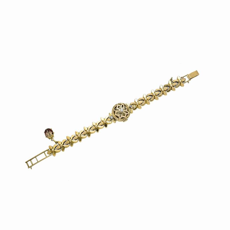Bracciale orologio in oro giallo e diamanti