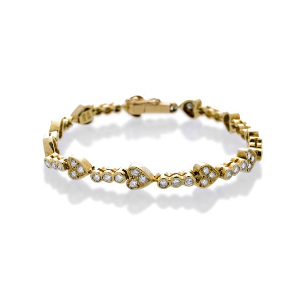 Bracelet with hearts in yellow gold and diamonds