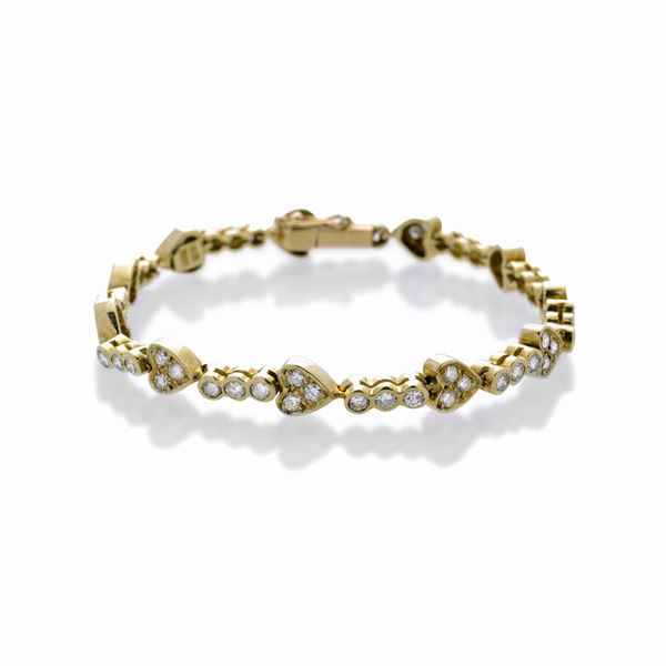 Braccialetto con cuori in oro giallo e diamanti