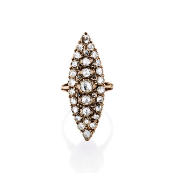Lozenge ring in low title gold and diamonds