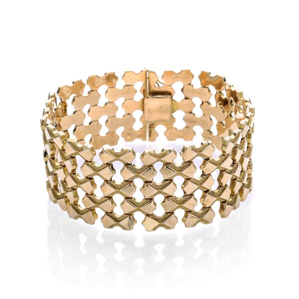 High bracelet in yellow gold