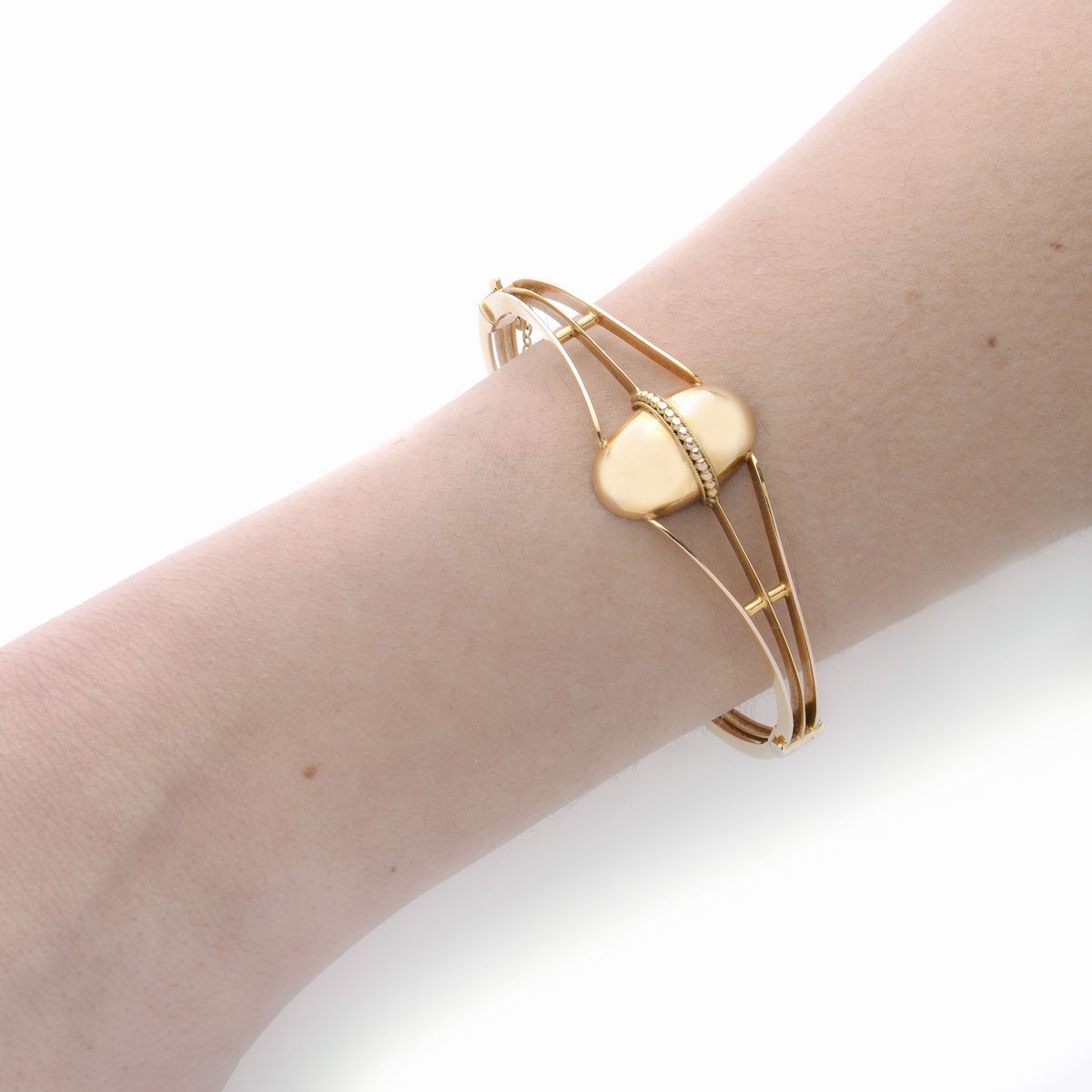 Bracciale rigido in oro a basso titolo