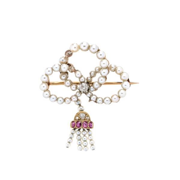 Bow brooch in low title gold, micro-pearls, diamonds and rubies