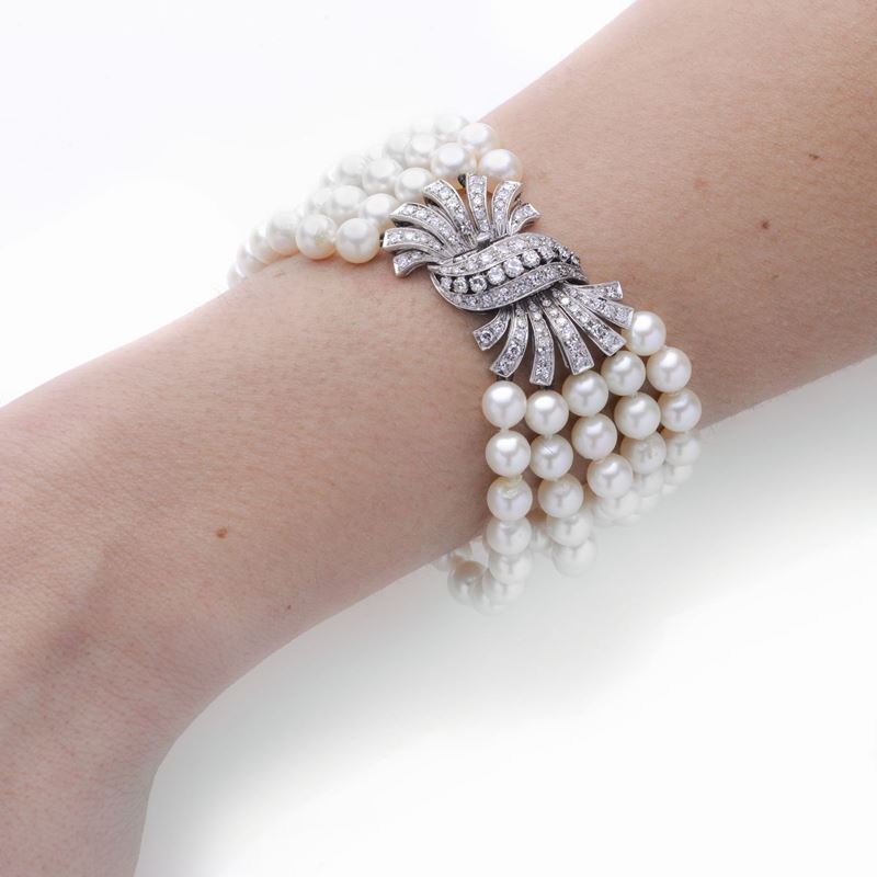 Bracciale in perle coltivate, oro bianco e diamanti