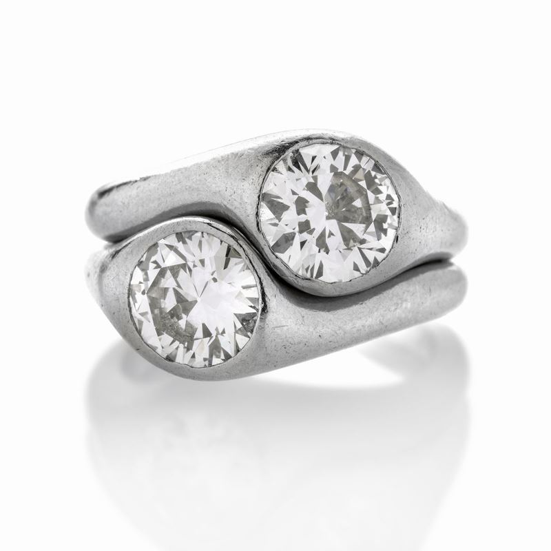 Anello contrariè in platino e diamanti