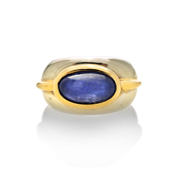Band ring in white gold, yellow gold and sapphire