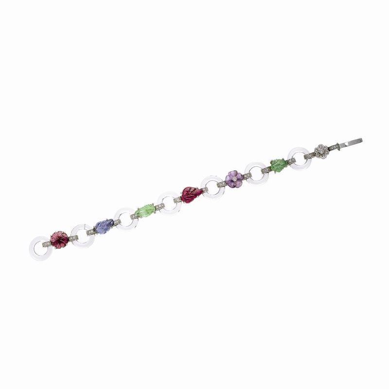 Bracciale in oro bianco, diamanti, cristallo di rocca, zaffiri, rubini, smeraldi e ametista