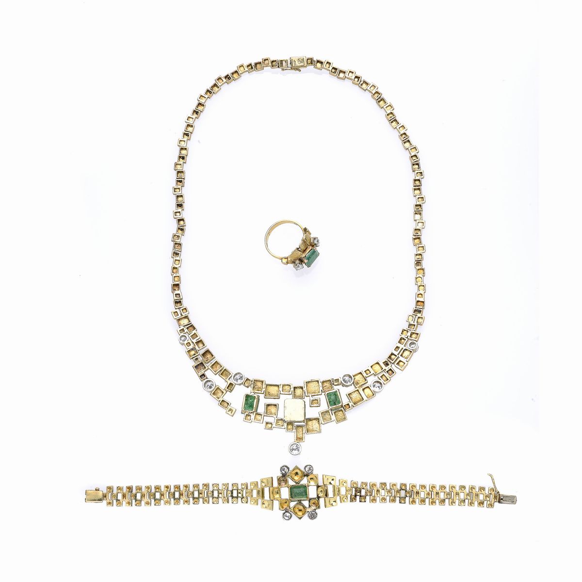 Importante parure in oro giallo, oro bianco, diamanti e smeraldi