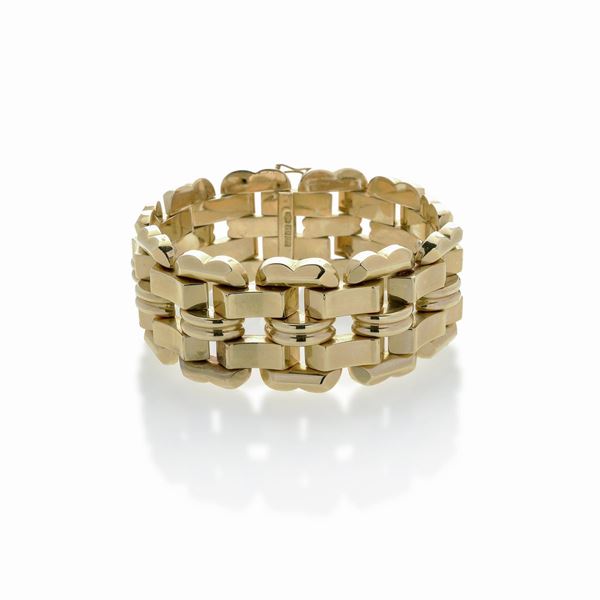 High bracelet in yellow gold