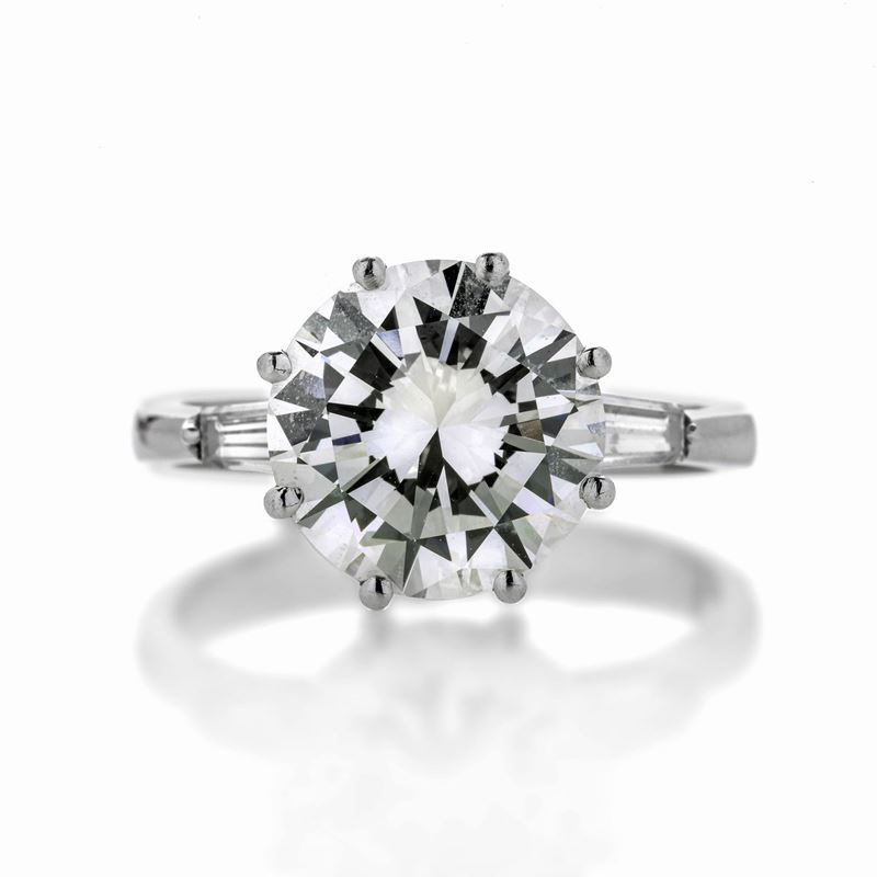 Anello solitario in oro bianco e diamanti