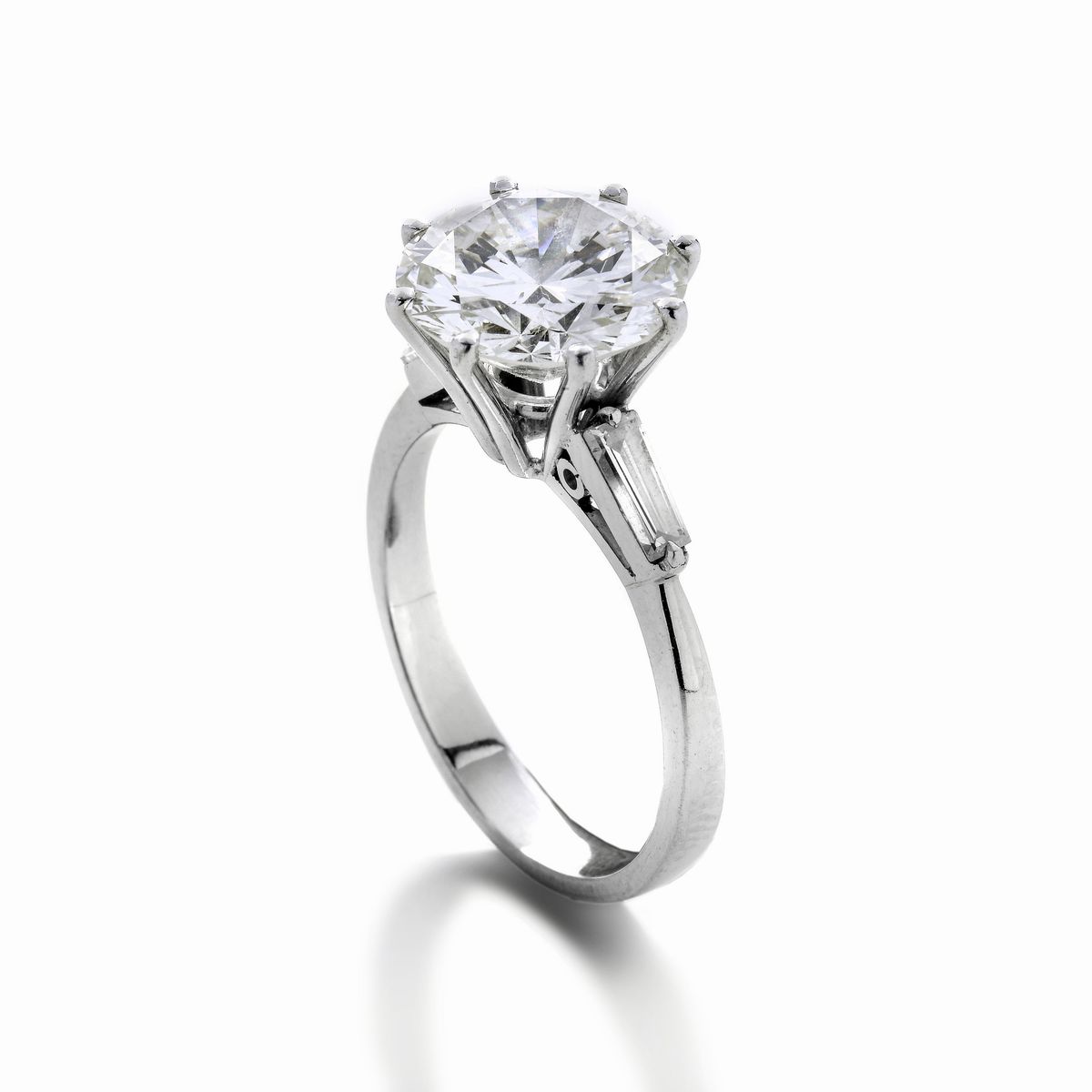 Anello solitario in oro bianco e diamanti