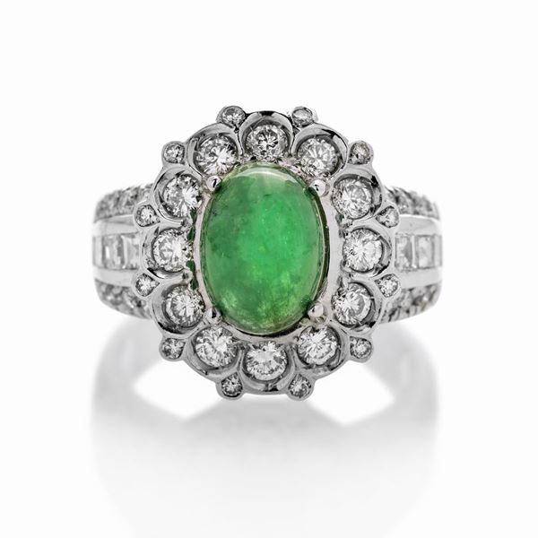 Ring in white gold, diamonds and emerald
