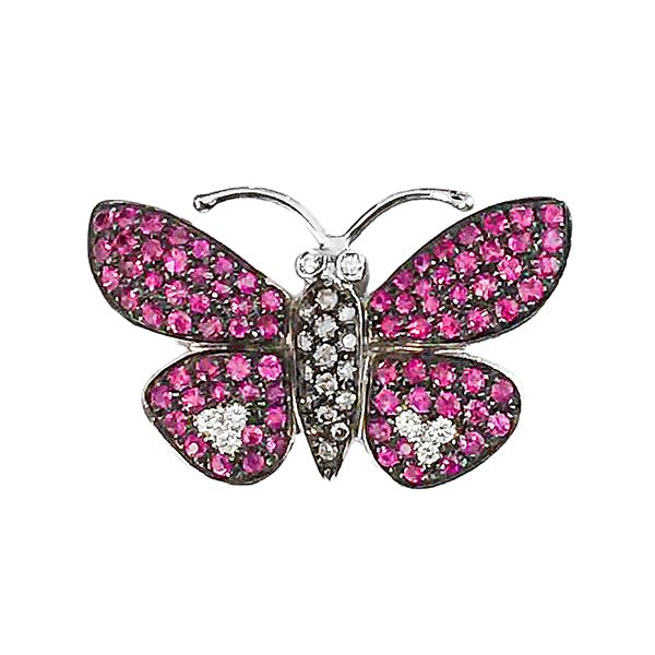 Butterfly brooch in white gold, brown diamonds and rubies