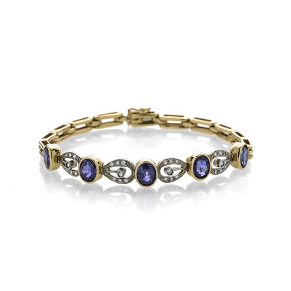 Bracelet in yellow gold, diamonds and shappires