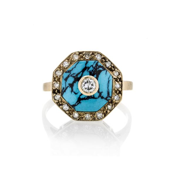 Ring in low title gold, diamonds and turquoise