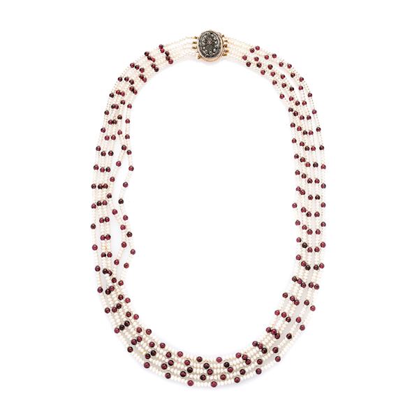 Necklace in low title gold, silver, pearl, garnets and diamonds