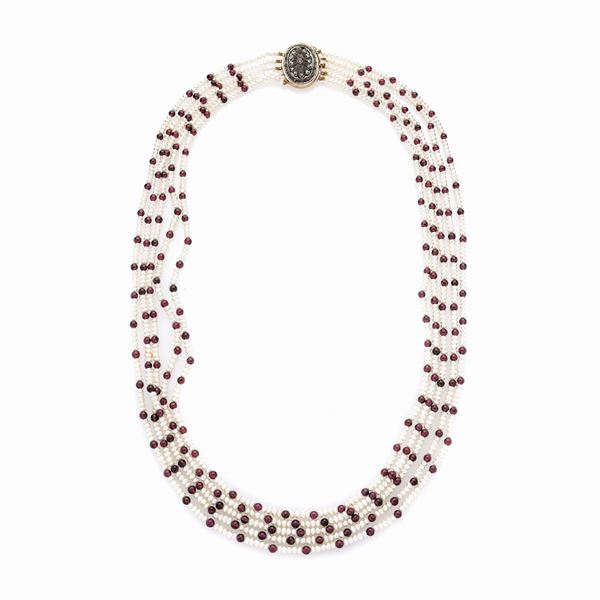 Necklace in low title gold, silver, pearl, garnets and diamonds
