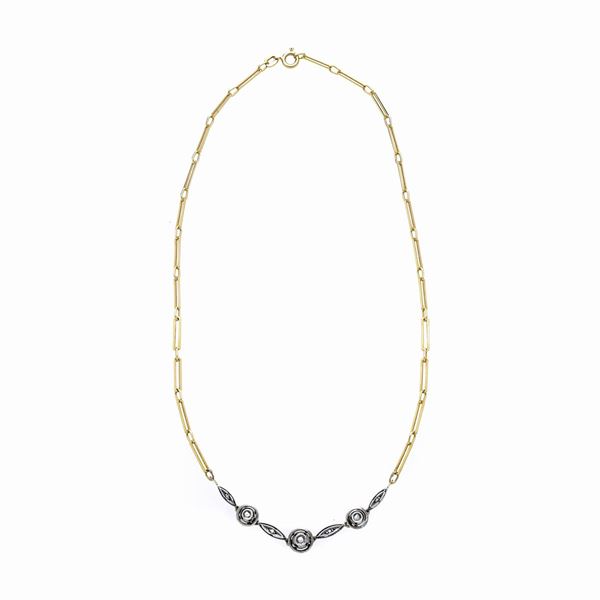 Crew-neck in yellow gold, silver and diamonds