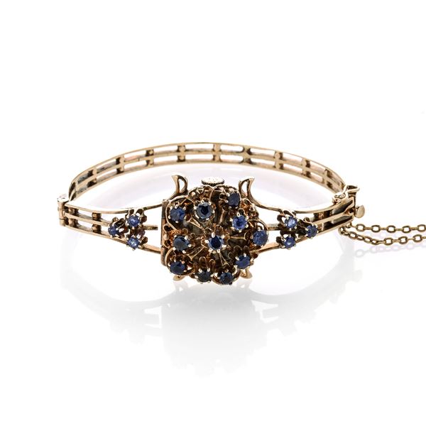 Watch bracelet in 14kt gold and sapphires