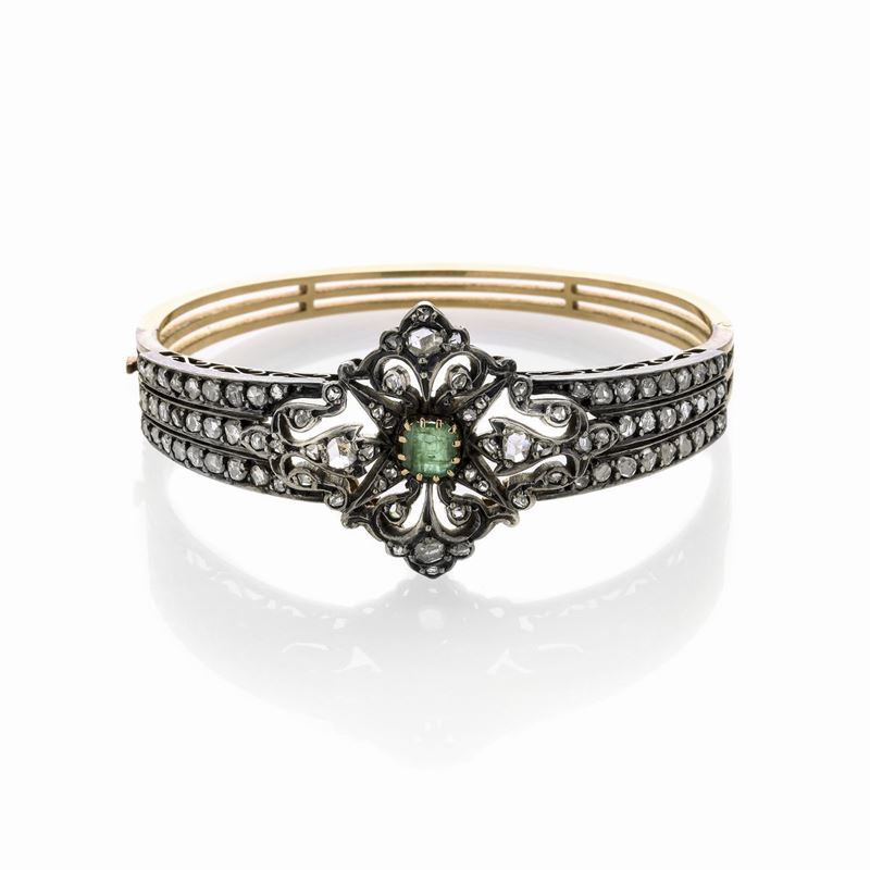 Bracciale rigido in oro giallo, argento, diamanti e smeraldo
