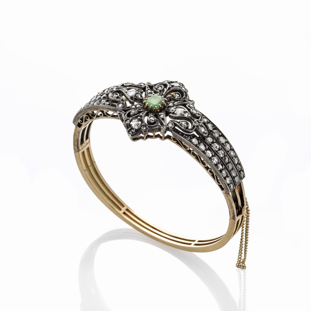 Bracciale rigido in oro giallo, argento, diamanti e smeraldo