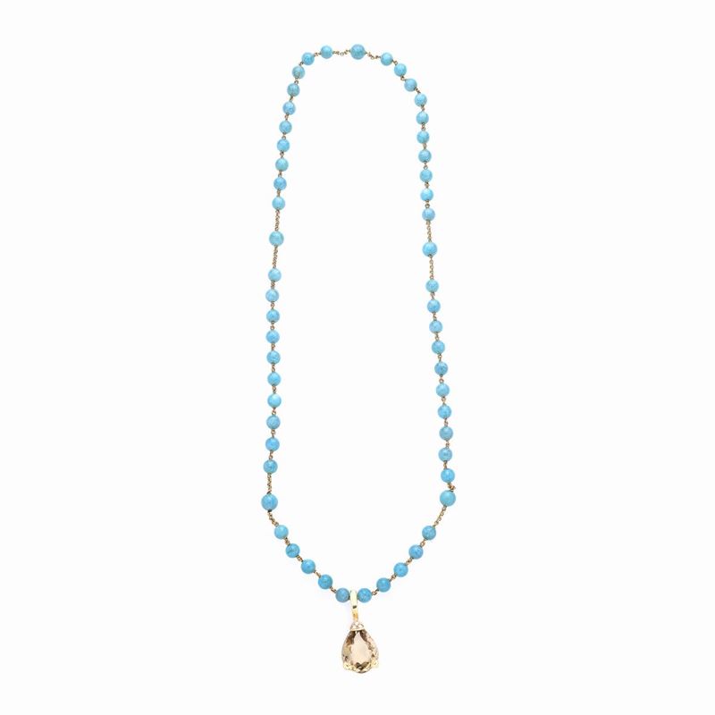 Collana in oro giallo e calcedonio azzurro con pendente in oro giallo, diamanti e quarzo citrino
