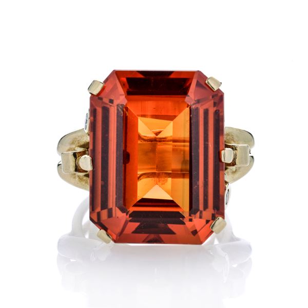 Ring in yellow gold, diamonds and large orange stone
