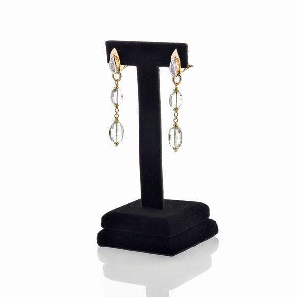 Pair of pendant earrings in yellow gold, white gold, diamonds and blue quartz