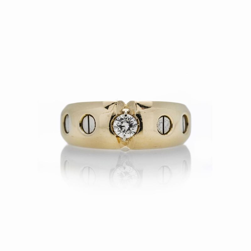 Anello a fascia in oro giallo e diamante