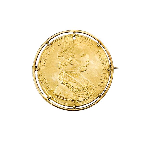 Brooch whit coin in yellow gold