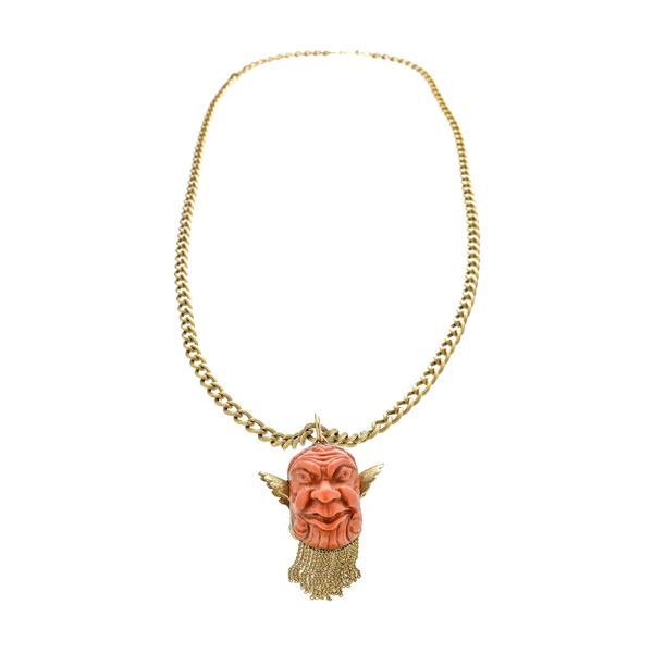 Long necklace in yellow gold with Bacchus pendant in coral and yellow gold