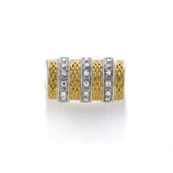 Sculpture ring in yellow gold, white gold and diamonds