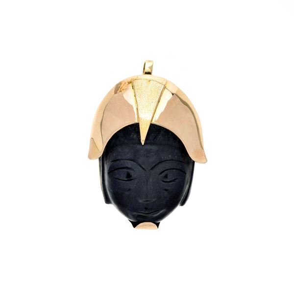 Spilla pendente 'maschera orientale' in oro giallo e pietra nera
