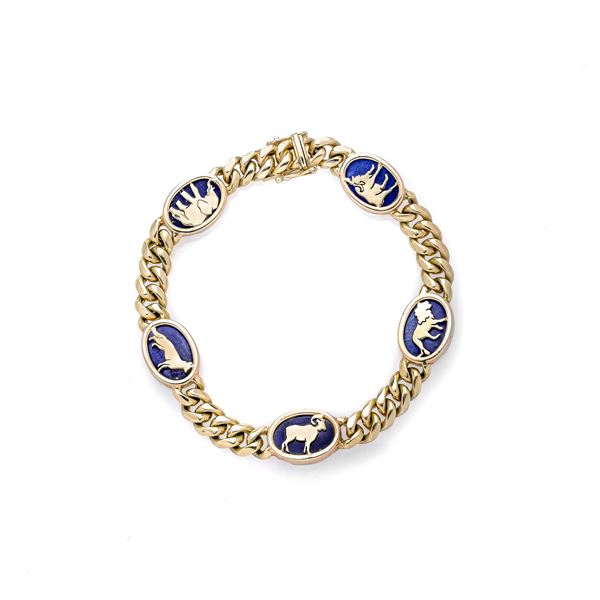 Bracelet in 14 kt yellow gold and blue stone