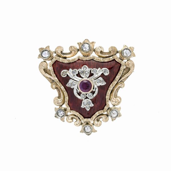 Brooch in yellow gold, red enamel, diamonds and rubies