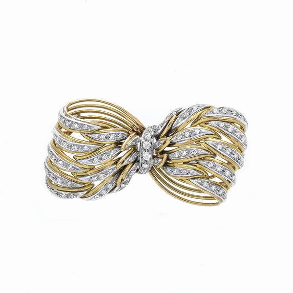 Spilla Fiocco in oro giallo, oro bianco e diamanti