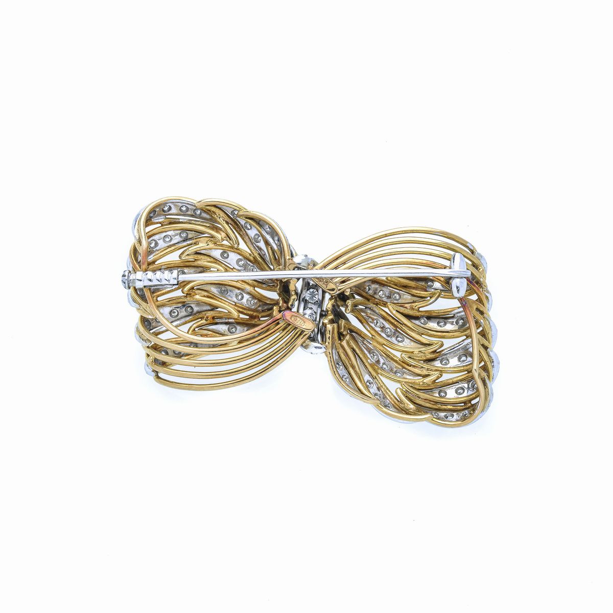Spilla Fiocco in oro giallo, oro bianco e diamanti