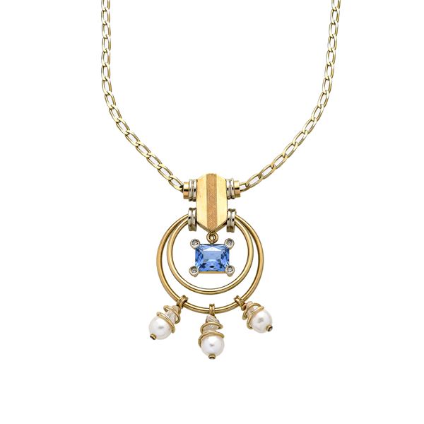 Chain and pendant in yellow gold, diamonds, blue stone and pearls
