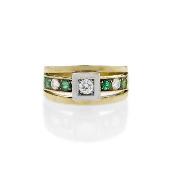 Band ring in yellow gold, white gold, emeralds and diamonds