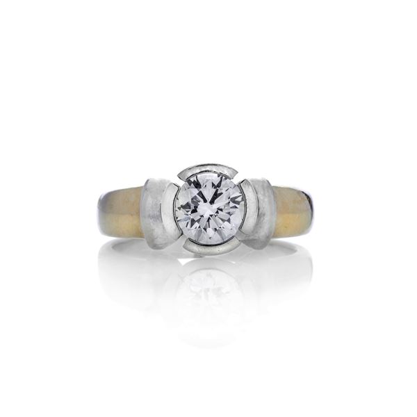 Solitaire ring in yellow gold, white gold and diamond